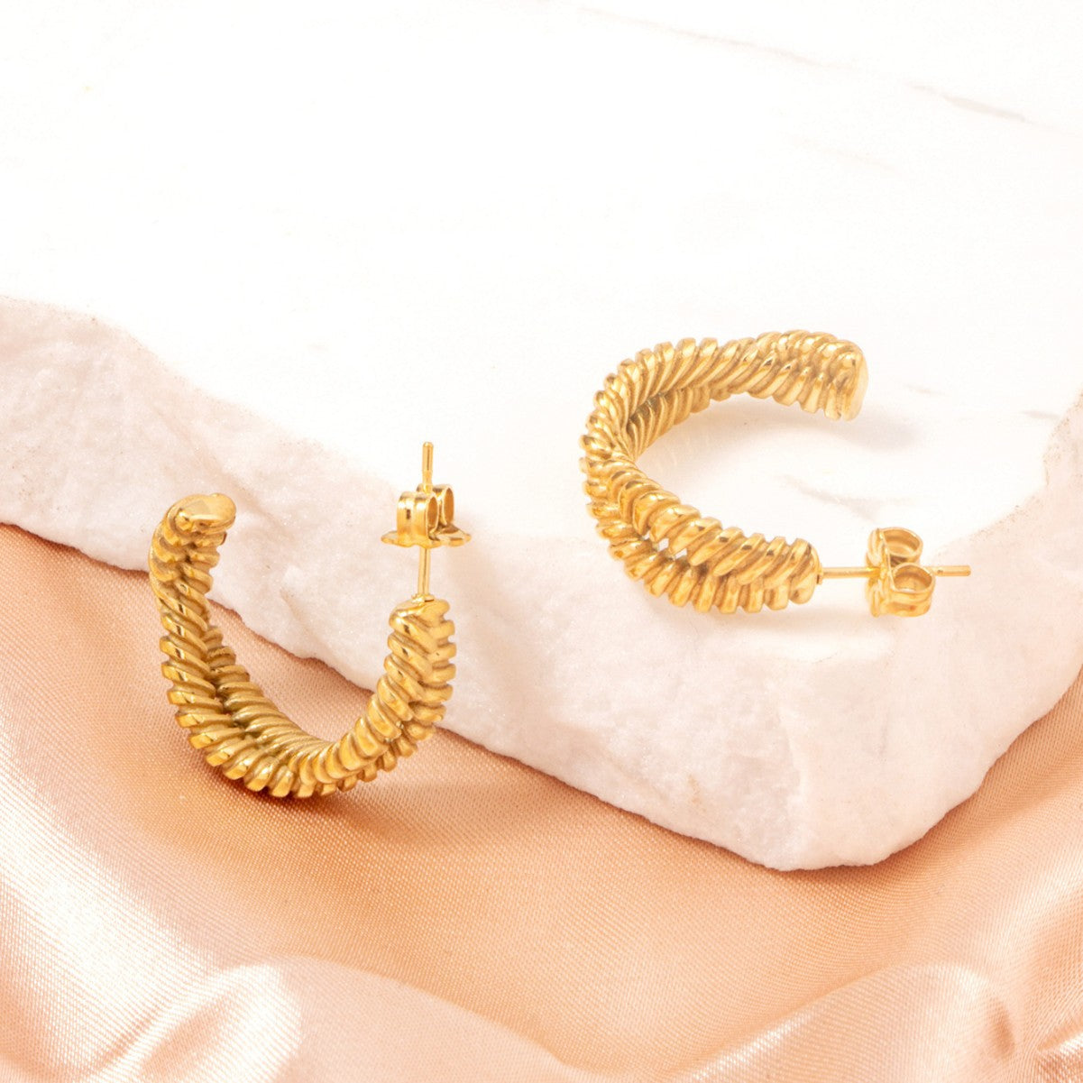 GOLD TWISTED HOOP EARRINGS