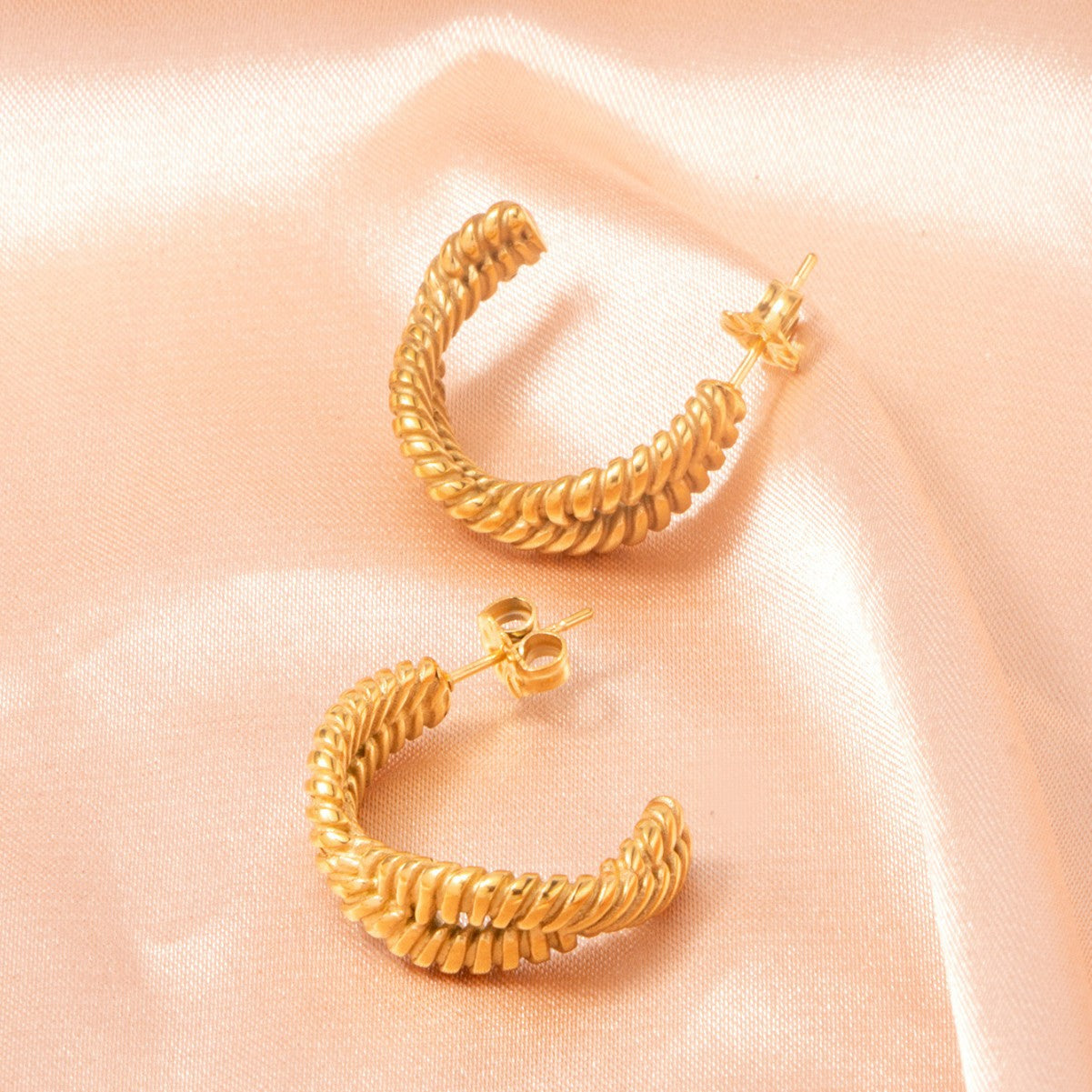 GOLD TWISTED HOOP EARRINGS