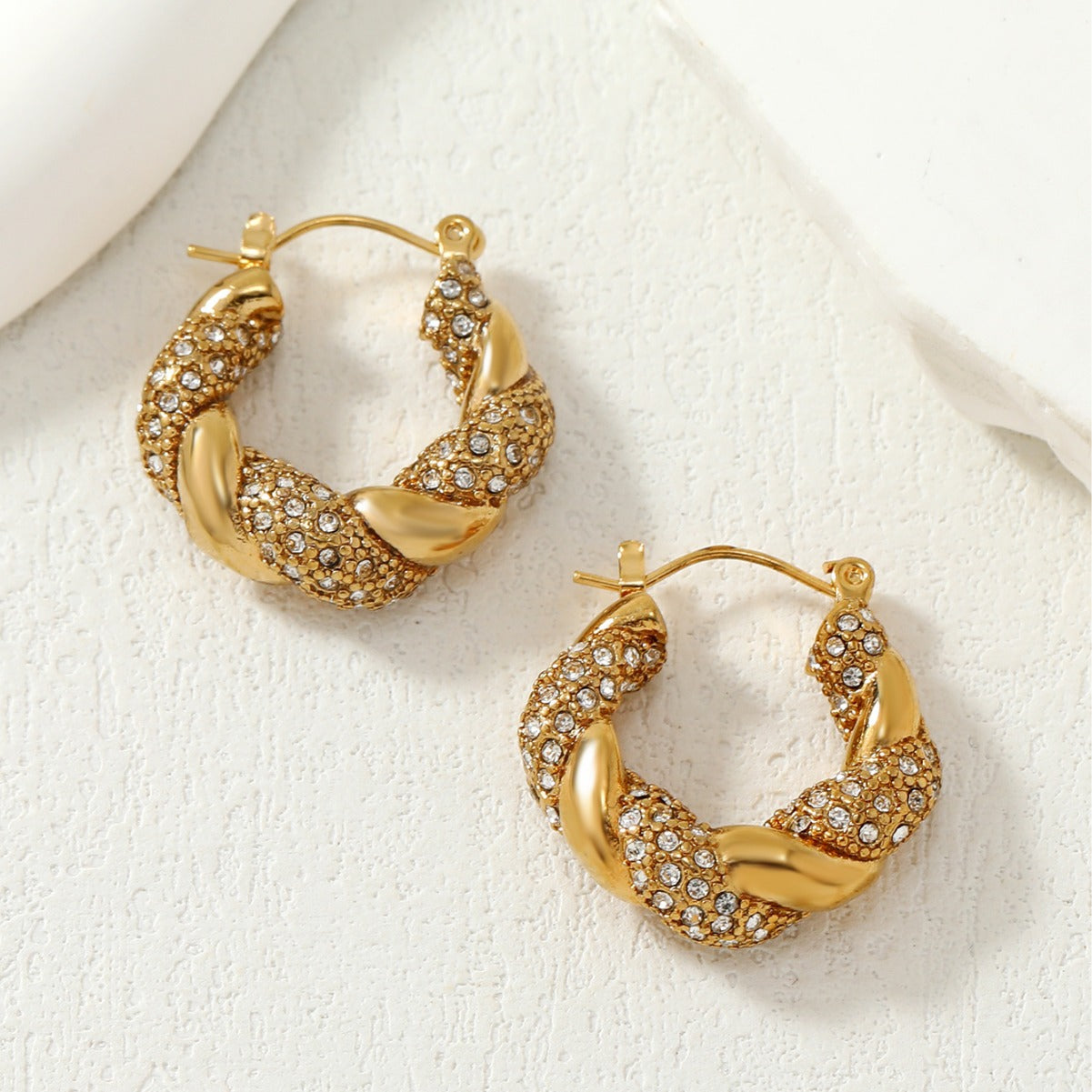 GOLD TWISTED HOOP EARRINGS