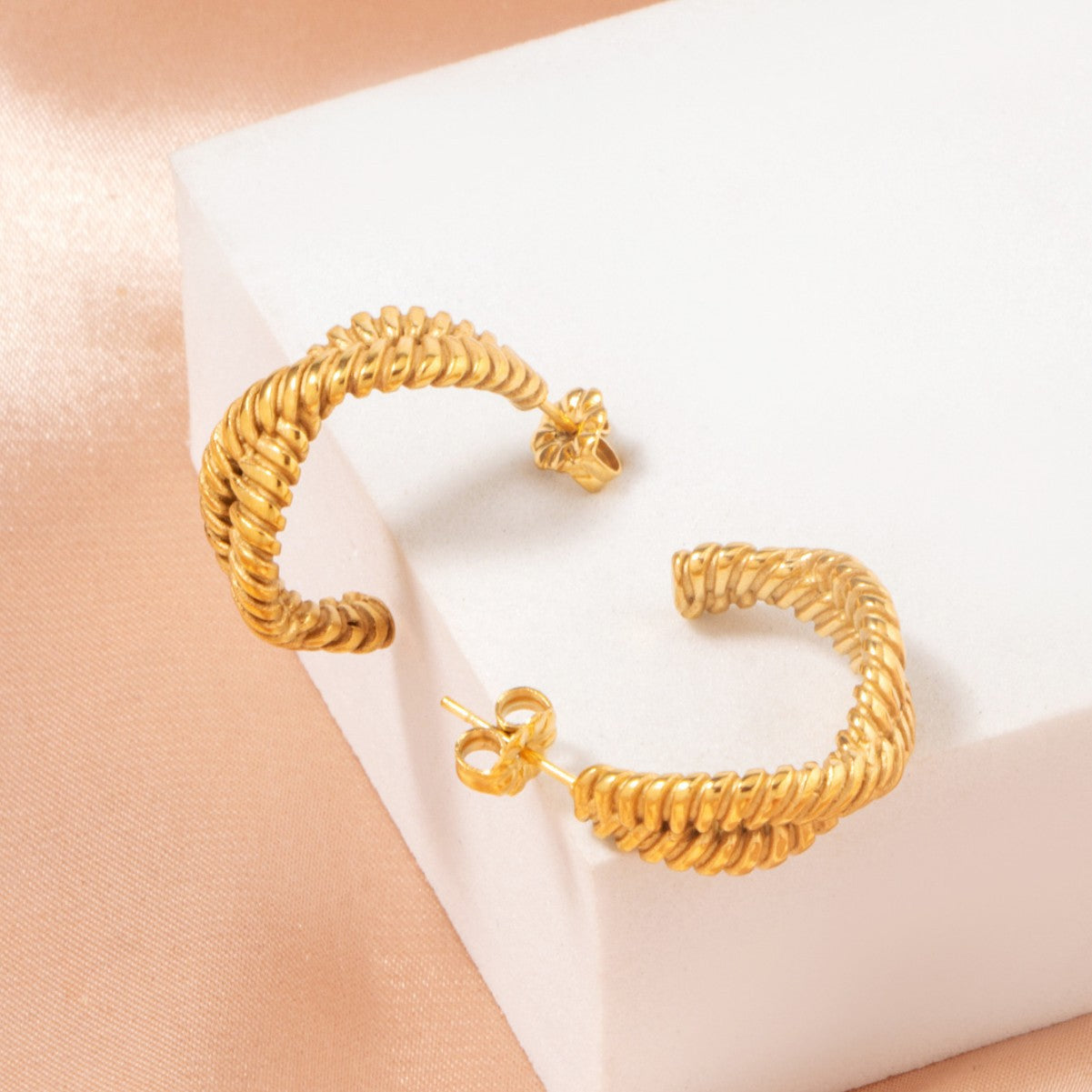 GOLD TWISTED HOOP EARRINGS