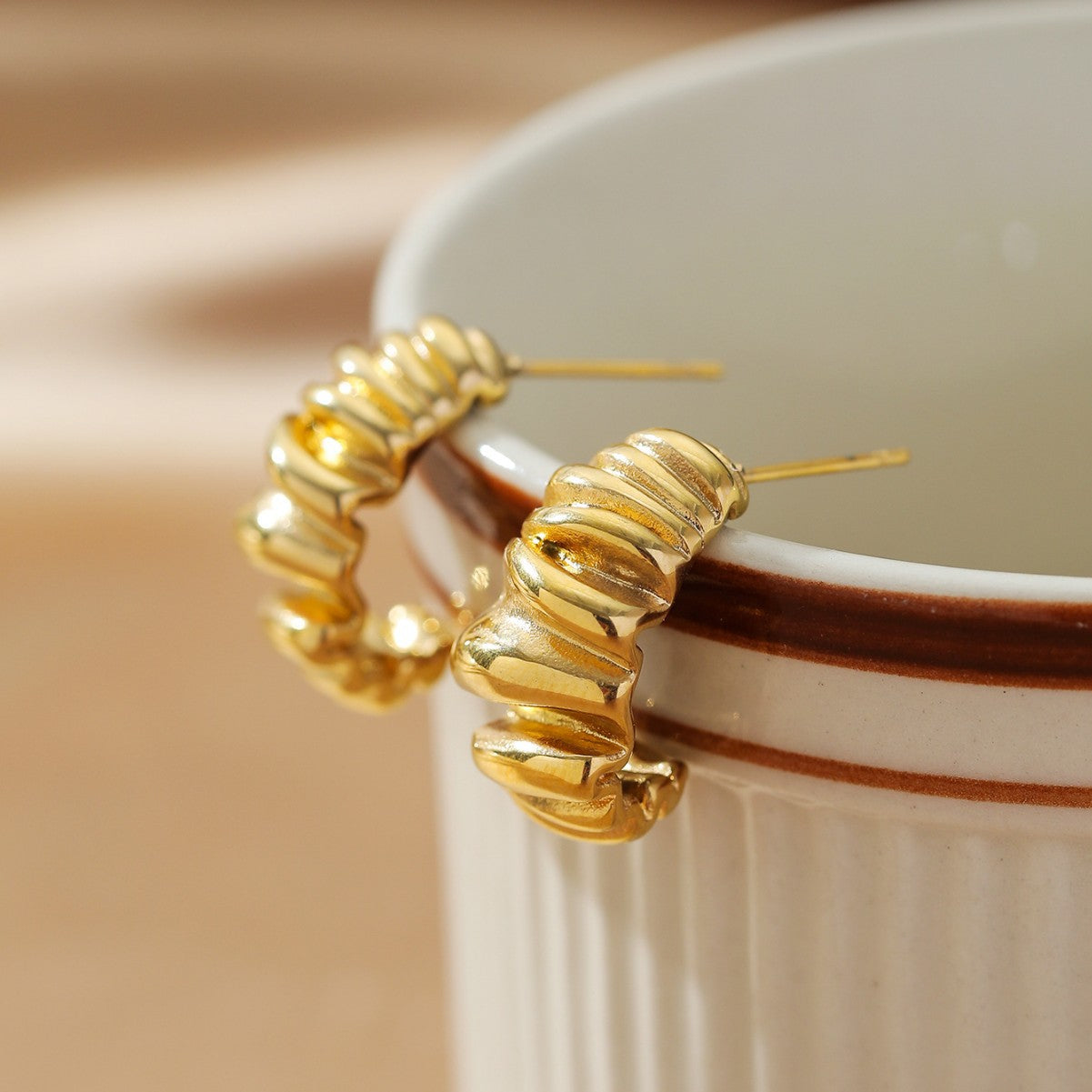 CRESCENT HUGGIE HOOP EARRINGS