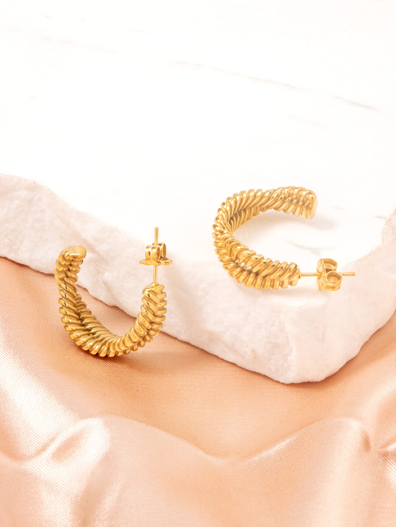 GOLD TWISTED HOOP EARRINGS