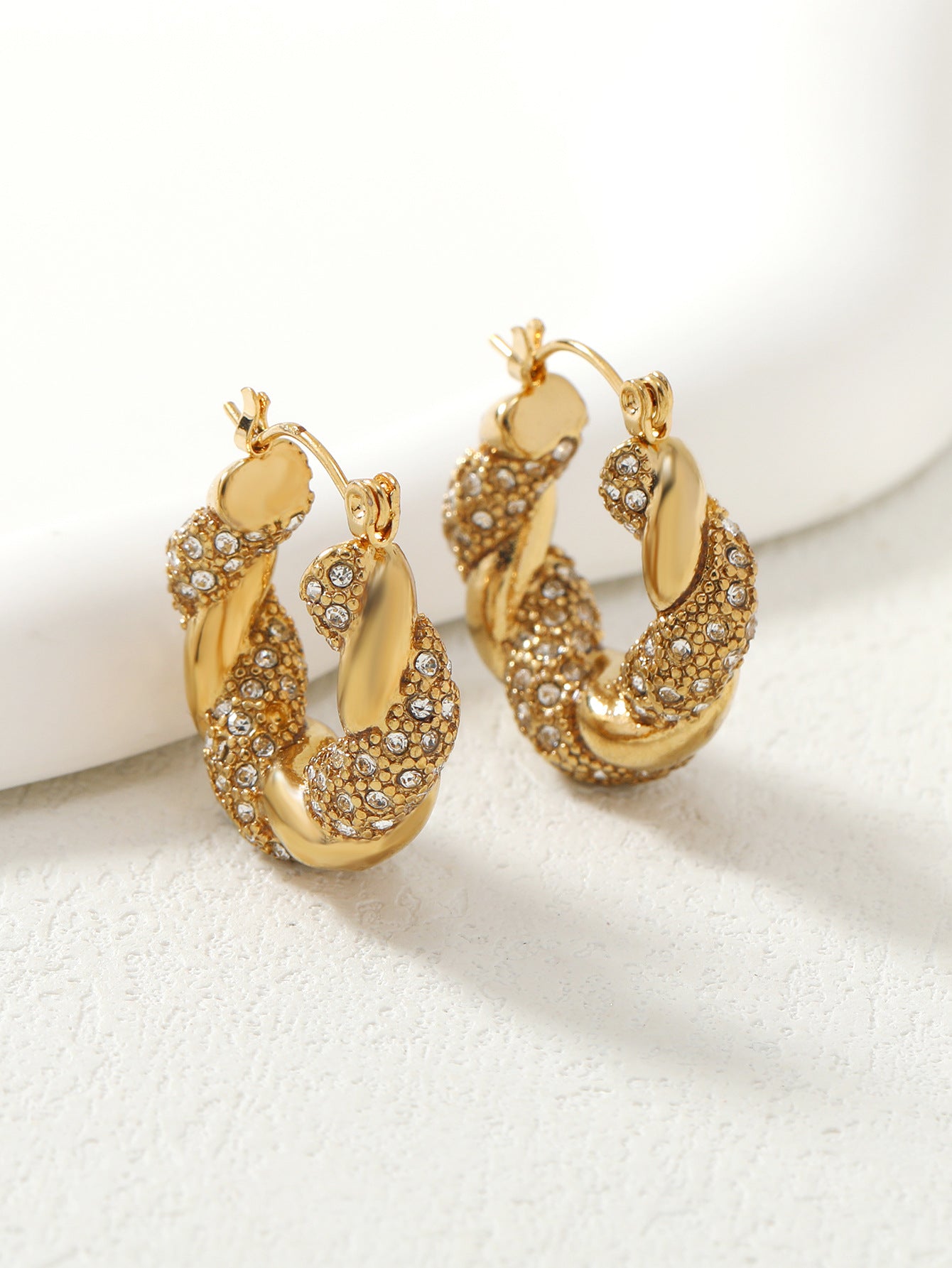 GOLD TWISTED HOOP EARRINGS