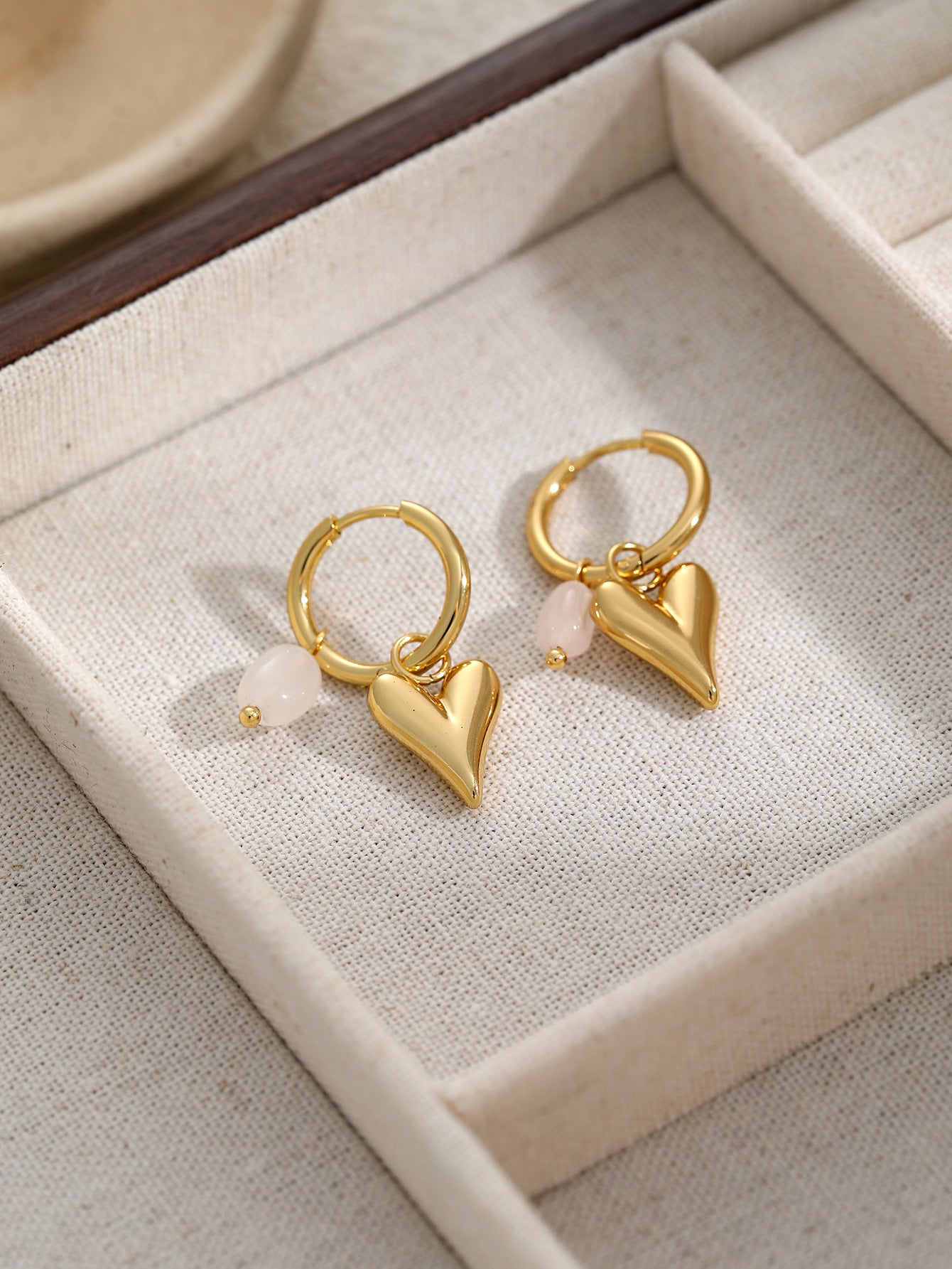 GOLD HEART HUGGIE EARRINGS